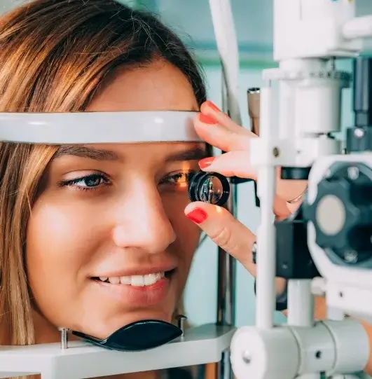 Women in eye clinic getting eye measured